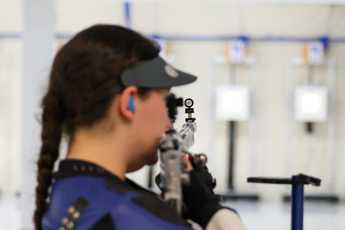 Kentucky fifth year Jaden Thompson lines up a shot during the Kentucky vs. Ole Miss rifle match on Sunday, Nov. 5, 2023, at the Buell Armory in Lexington, Kentucky. Kentucky won 4718-4707. Photo by Sydney Yonker | Staff