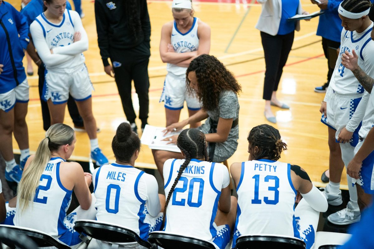 Kentucky head coach Kyra Elzy coaches her team during a timeout during the Kentucky vs. ETSU womens basketball game on Tuesday, Nov. 7, 2023, at the Clive M. Beck Center in Lexington, Kentucky. Kentucky won 74-66 Photo by Travis Fannon | Staff