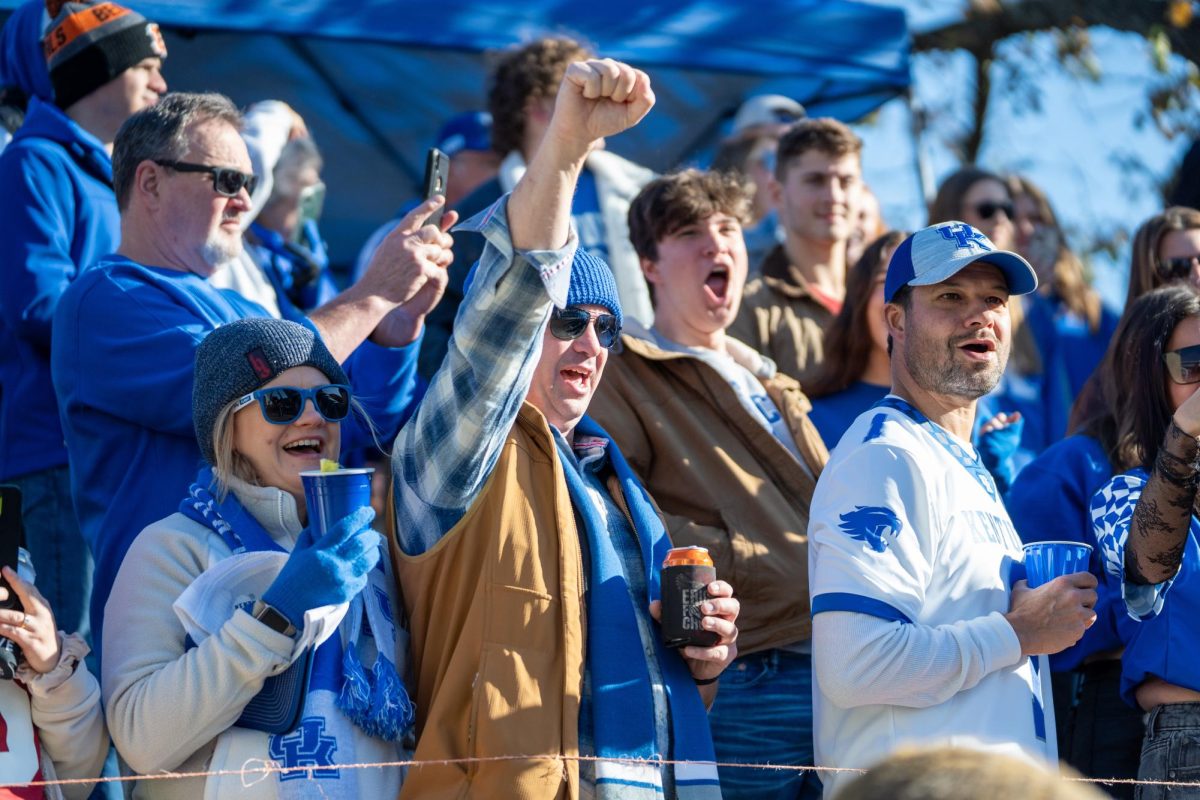 Fans cheer as Kentucky players and coaches walk by during the Catwalk before the Kentucky vs. Alabama football game on Saturday, Nov. 11, 2023, at Kroger Field in Lexington, Kentucky. Photo by Travis Fannon | Staff