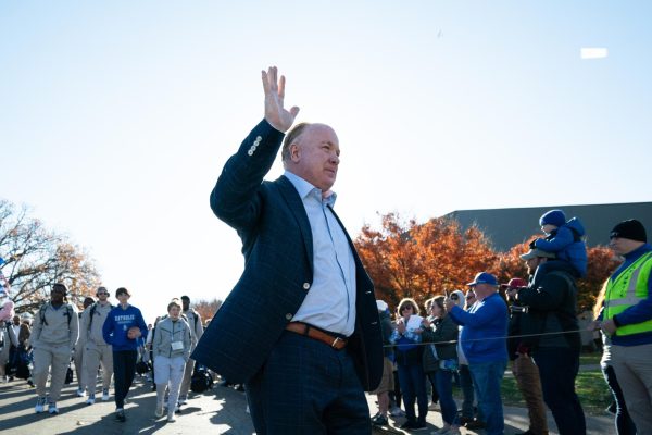 Kentucky head coach Mark Stoops waves at fans during the Catwalk before the Kentucky vs. Alabama football game on Saturday, Nov. 11, 2023, at Kroger Field in Lexington, Kentucky. Photo by Travis Fannon | Staff