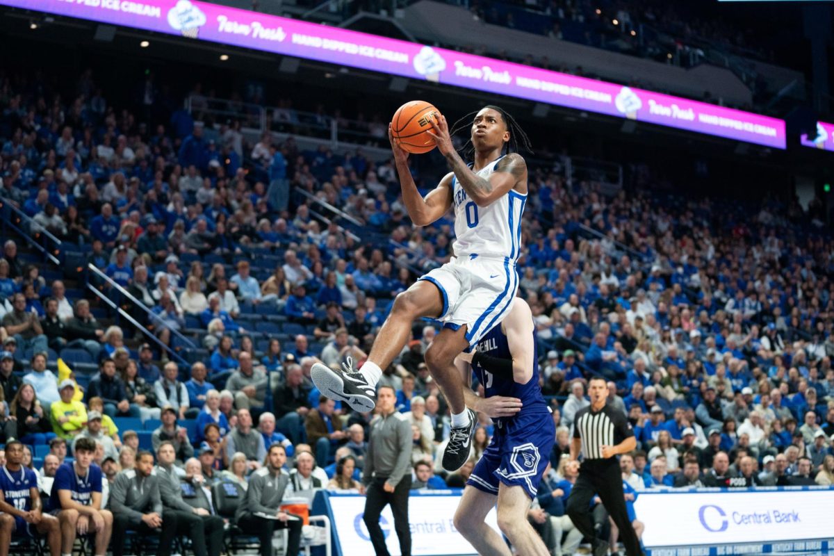 Kentucky guard Rob Dillingham (0) shoots the ball mid air during the Kentucky vs. Stonehill mens basketball game on Friday, Nov. 17, 2023, at Rupp Arena in Lexington, Kentucky. Photo by Travis Fannon | Staff
