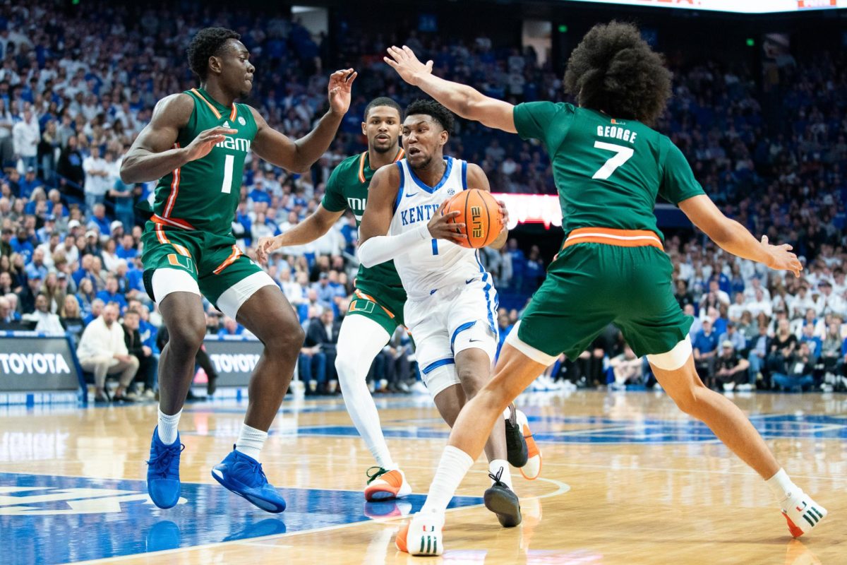 Kentucky guard Justin Edwards (1) drives the ball into the paint during the No. 12 Kentucky vs. No. 8 Miami mens basketball game on Tuesday, Nov. 28, 2023, at Rupp Arena in Lexington, Kentucky. Kentucky won 95-73. Photo by Travis Fannon | Staff