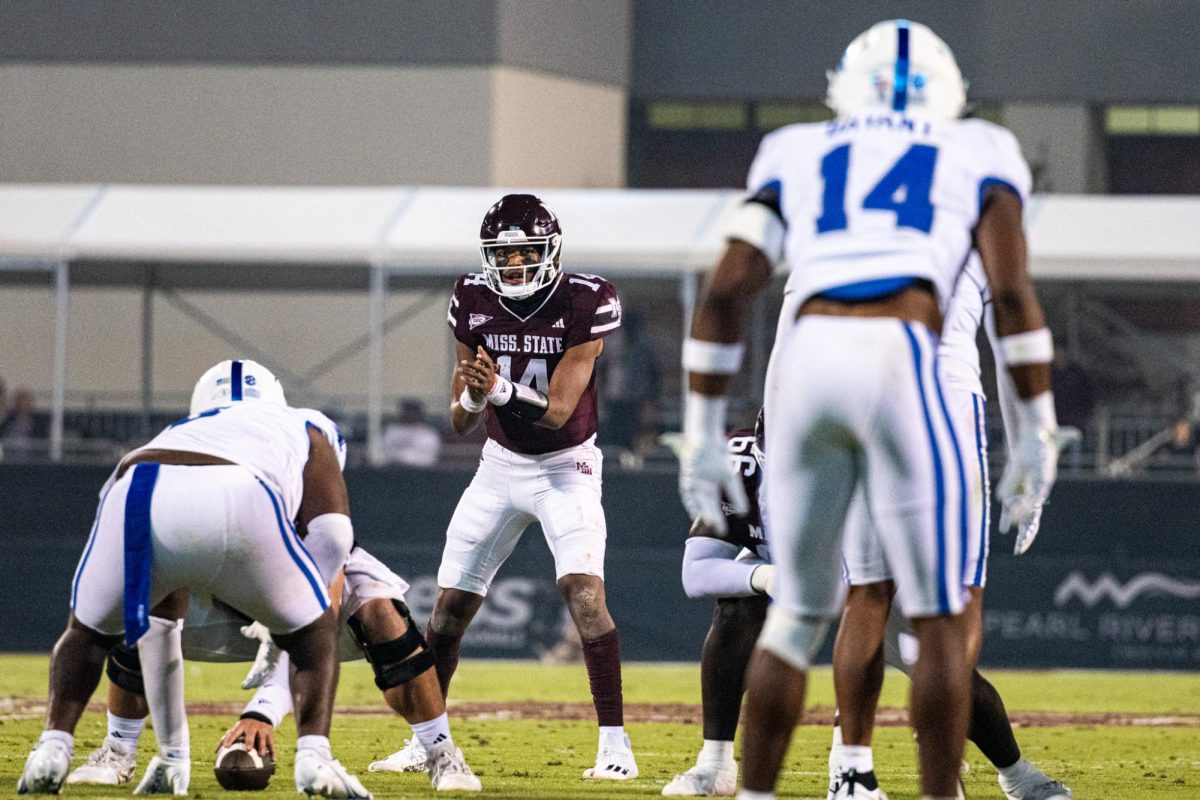 Mississippi State quarterback Mike Wright (14) eyes Kentucky defensive back Ty Bryant (14) during the Kentucky vs. Mississippi State football game on Saturday, Nov. 4, 2023, at Davis Wade Stadium in Starkville, Mississippi. Photo by Isaiah Pinto | Staff