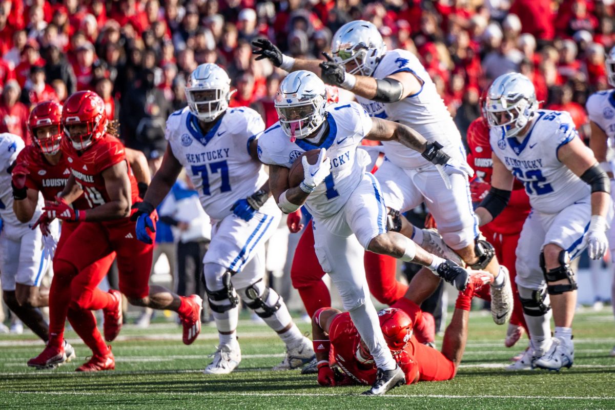 Kentucky running back Ray Davis (1) runs with the ball during the Kentucky vs. Louisville football game on Saturday, Nov. 25, 2023, at L&N Federal Credit Union Stadium in Louisville, Kentucky. Kentucky won 38-31. Photo by Samuel Colmar | Staff