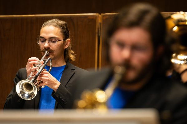 A trumpet player performs during the UK Jazz Ensemble concert on Thursday, Nov. 2, 2023, at the Singletary Center for the Arts in Lexington, Kentucky. Photo by Samuel Colmar | Staff