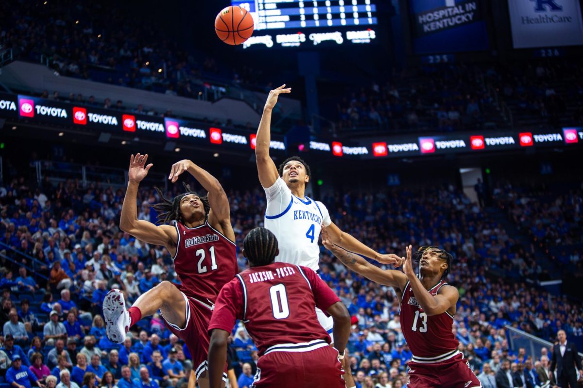 Kentucky forward Tre Mitchell (4) goes for a rebound during the No. 16 Kentucky vs. New Mexico State mens basketball game on Monday, Nov. 6, 2023, at Rupp Arena in Lexington, Kentucky. Kentucky won 86-46. Photo by Samuel Colmar | Staff