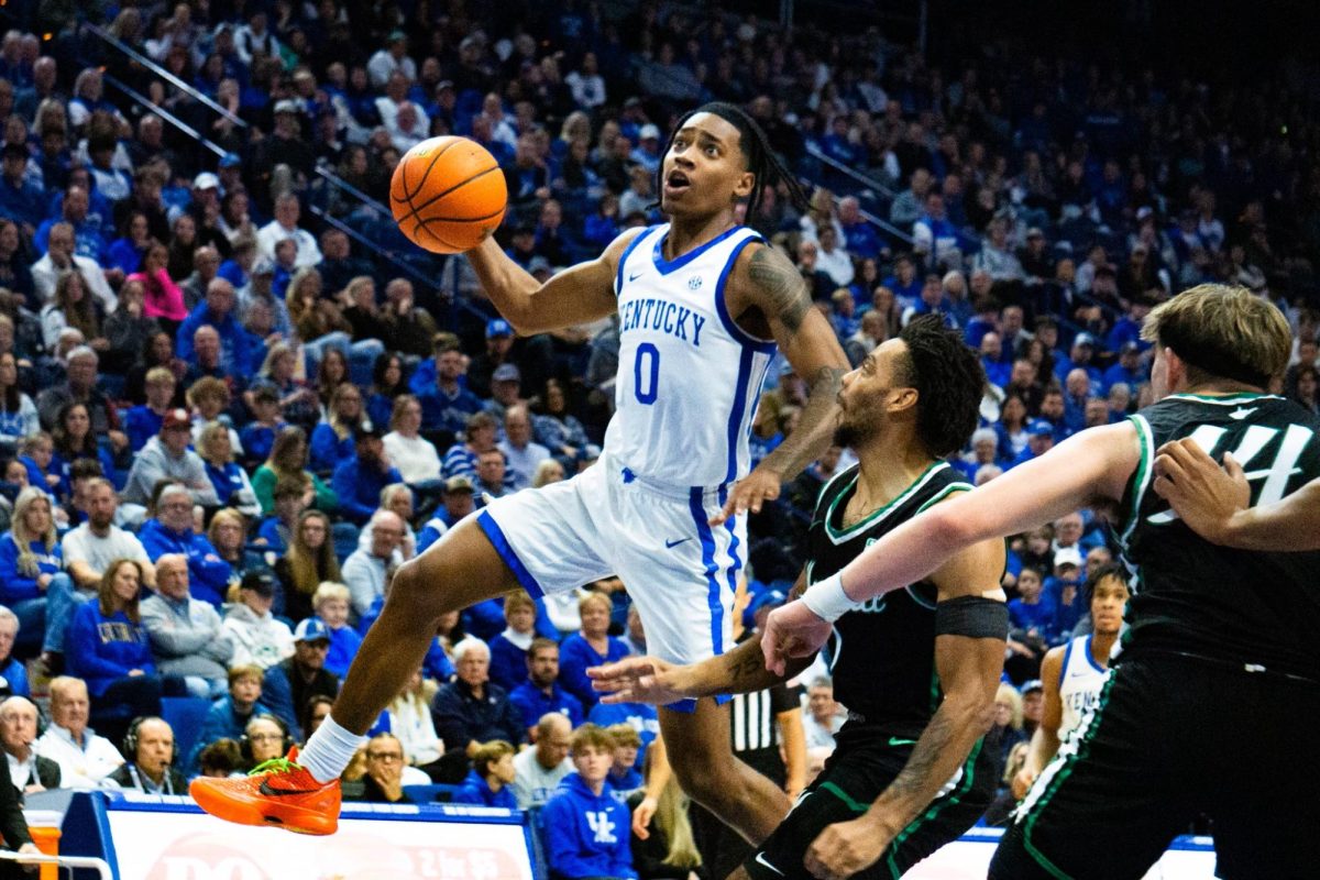 Kentucky guard Rob Dillingham (0) goes for a layup during the Kentucky vs. Marshall mens basketball game on Friday, Nov. 24, 2023, at Rupp Arena in Lexington, Kentucky. Photo by Isaiah Pinto | Staff
