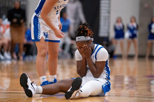 Kentucky guard Saniah Tyler sits on the guard after missing a shot during the Kentucky vs, Tennessee Tech womens basketball game Monday, Dec. 4, 2023, at the Clive M. Beck Center in Lexington, Kentucky. Kentucky won 73-67. Photo by Travis Fannon | Staff