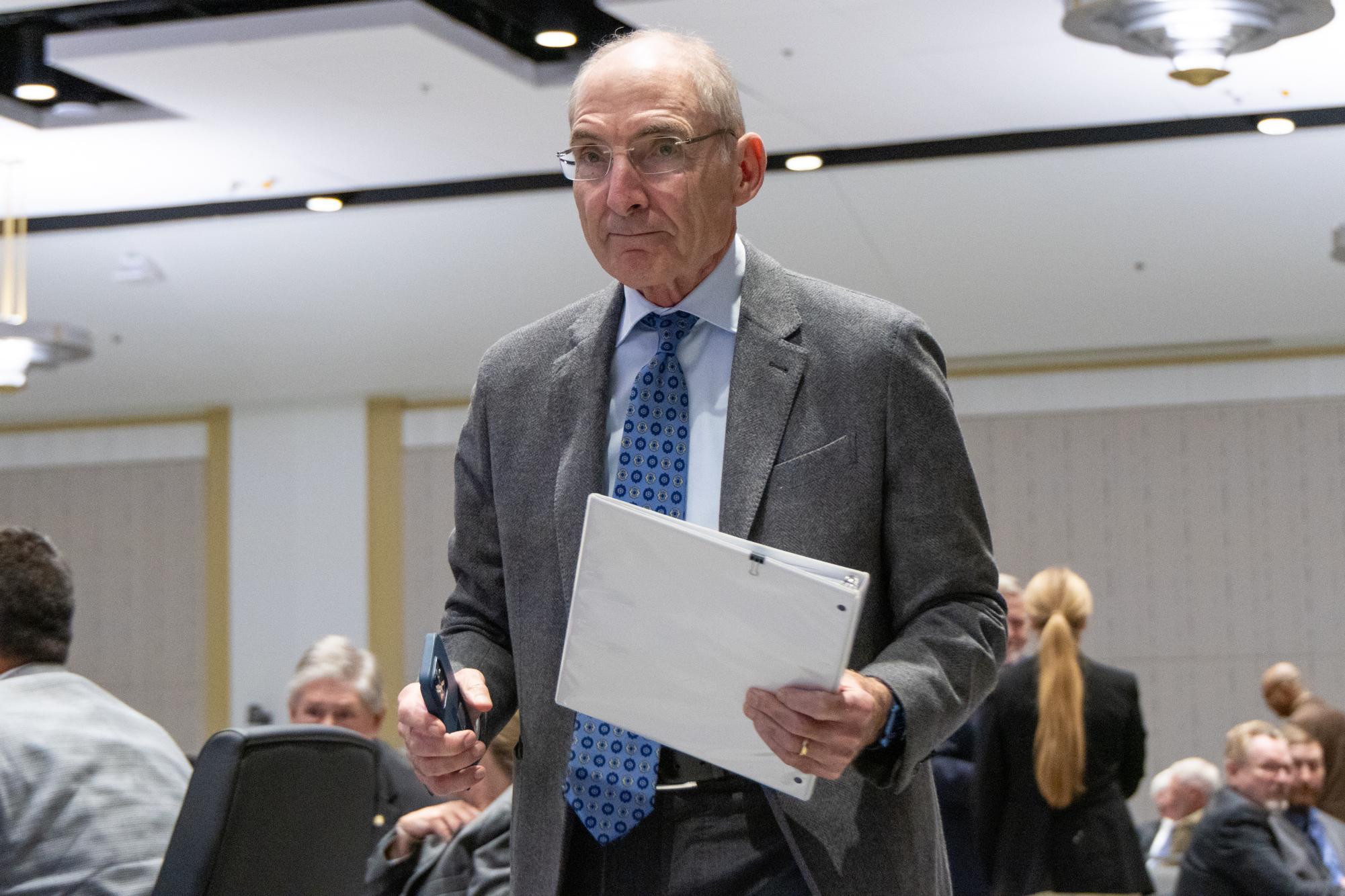 University of Kentucky President Eli Capilouto walks to the Podium during the Board of Trustees Meeting on Tuesday, Dec. 5, 2023, at the University of Kentucky in Lexington, Kentucky. Photo by Travis Fannon | Staff