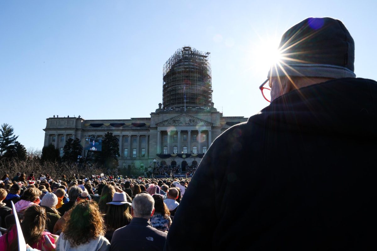 Attendees bow their heads in prayer during the 62nd Kentucky inauguration ceremony on Tuesday, Dec. 12, 2023, at the Kentucky State Capitol in Frankfort, Kentucky. Photo by Abbey Cutrer | Staff