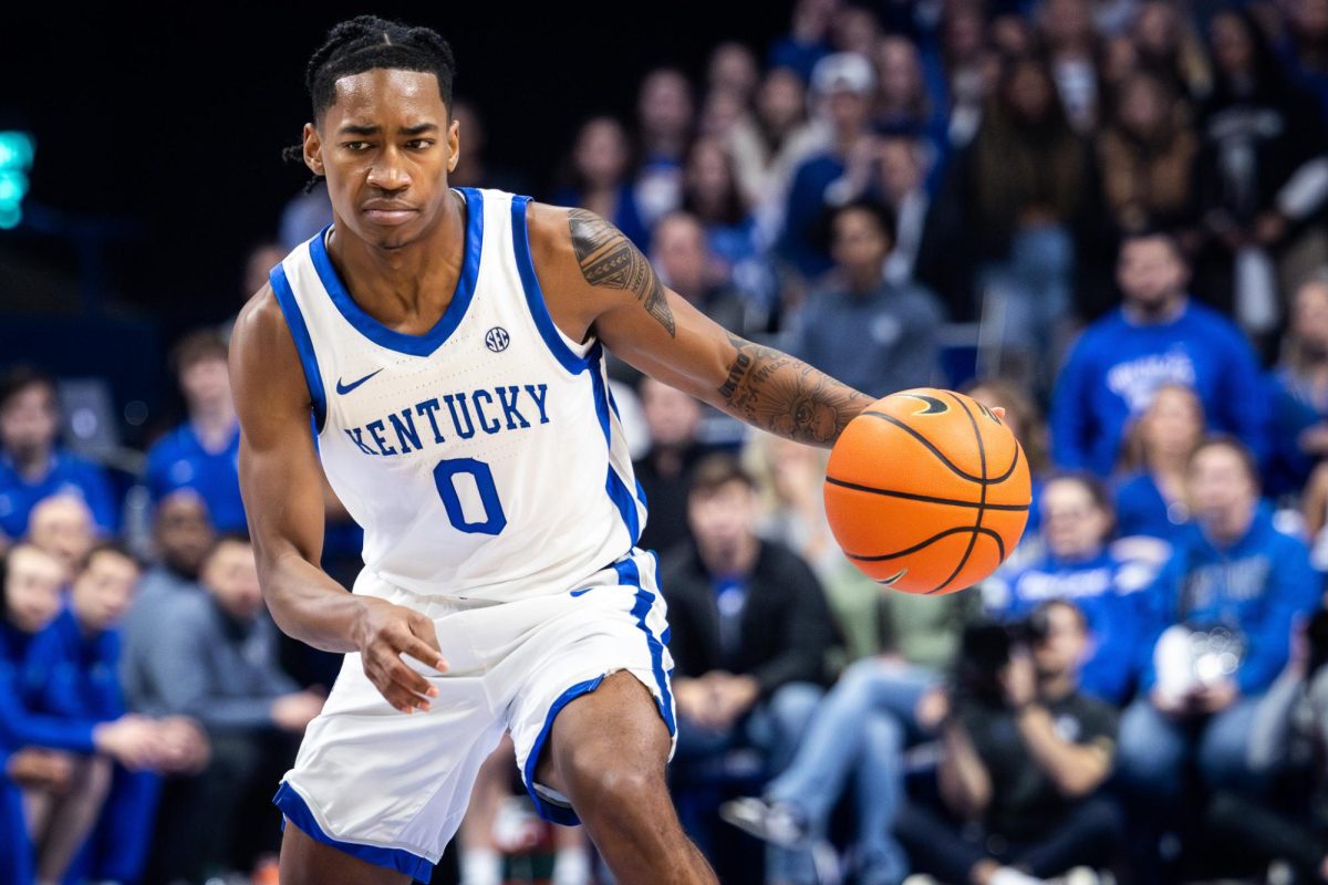Kentucky+guard+Rob+Dillingham+%280%29+drives+with+the+ball+during+the+Kentucky+vs.+North+Carolina+Wilmington+mens+basketball+game+on+Saturday%2C+Dec.+2%2C+2023%2C+at+Rupp+Arena+in+Lexington%2C+Kentucky.+Kentucky+lost+80-73.+Photo+by+Samuel+Colmar+%7C+Staff