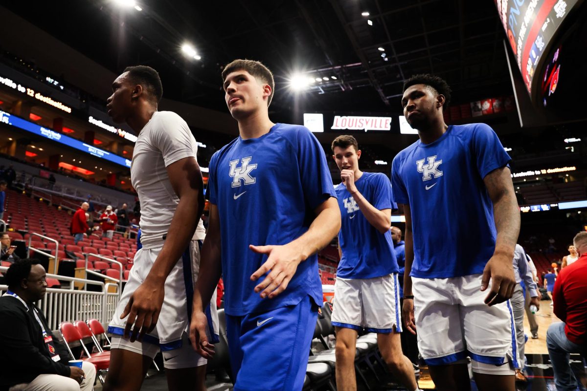 Kentucky guard Reed Sheppard leaves the court after warmups before the Kentucky vs. Louisville men’s basketball game on Thursday, Dec. 21, 2023, at the KFC Yum! Center in Louisville, Kentucky. Photo by Abbey Cutrer | Staff