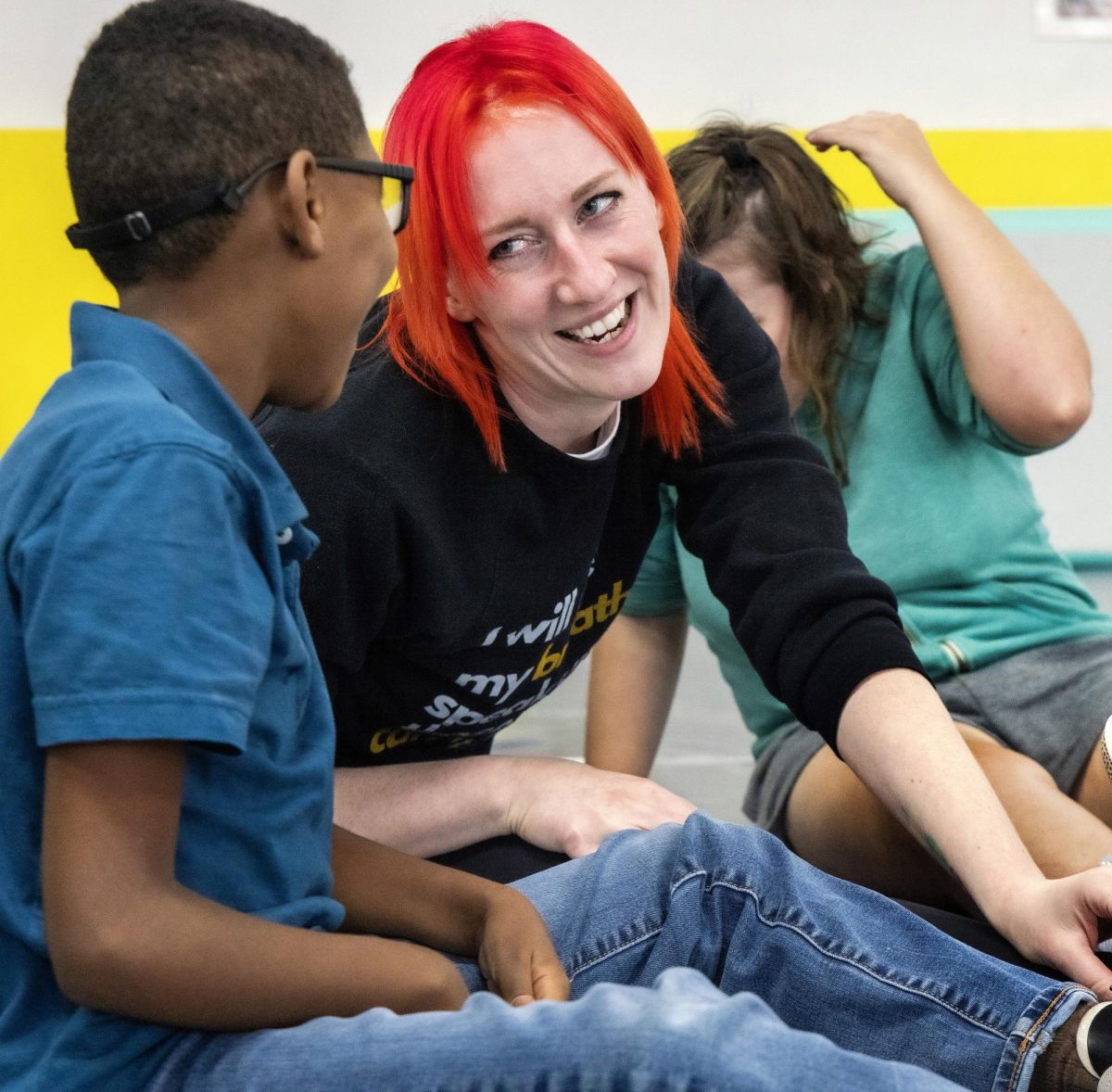 Amanda Whites, founder and dance instructor at Kentucky Dance Academy, speaks to a student in the special needs class on Thursday, Oct. 12, 2023, in Frankfort, Kentucky.