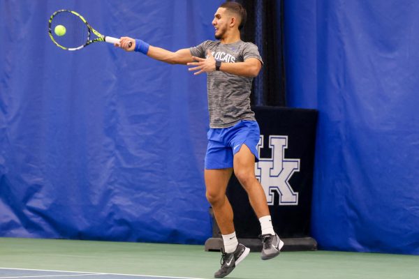 Kentucky fifth year Taha Baadi hits the ball during the Kentucky vs Notre Dame mens tennis match on Friday, Jan. 26, 2024, at the Hilary J. Boone Tennis Center in Lexington, Kentucky. Kentucky won 4-0. Photo by Sydney Yonker | Staff