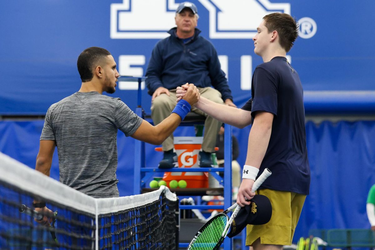 Kentucky fifth year Taha Baadi and Noter Dame senior Jean-Marc Malkowski shake hands during the Kentucky vs Notre Dame mens tennis match on Friday, Jan. 26, 2024, at the Hilary J. Boone Tennis Center in Lexington, Kentucky. Kentucky won 4-0. Photo by Sydney Yonker | Staff