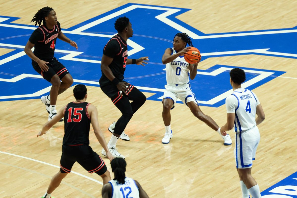 Kentucky guard Rob Dillingham passes the ball during the Kentucky vs. Georgia men’s basketball game on Saturday, Jan. 20, 2024, at Rupp Arena in Lexington, Kentucky. Kentucky won 105-96. Photo by Abbey Cutrer | Staff