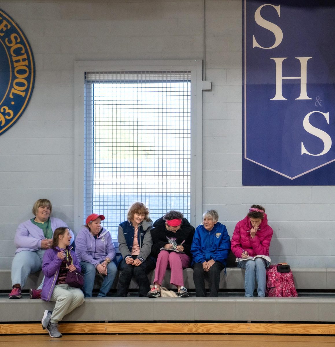 Students, talking during extra-cirrcular time, on Thursday, Oct 12, 2023, in the gym on Stewart Home School’s campus. Photo by Carlee Hogsten.