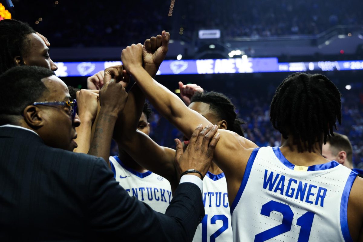 Kentucky guard D.J. Wagner and his team huddle during the Kentucky vs. Georgia men’s basketball game on Saturday, Jan. 20, 2024, at Rupp Arena in Lexington, Kentucky. Kentucky won 105-96. Photo by Abbey Cutrer | Staff
