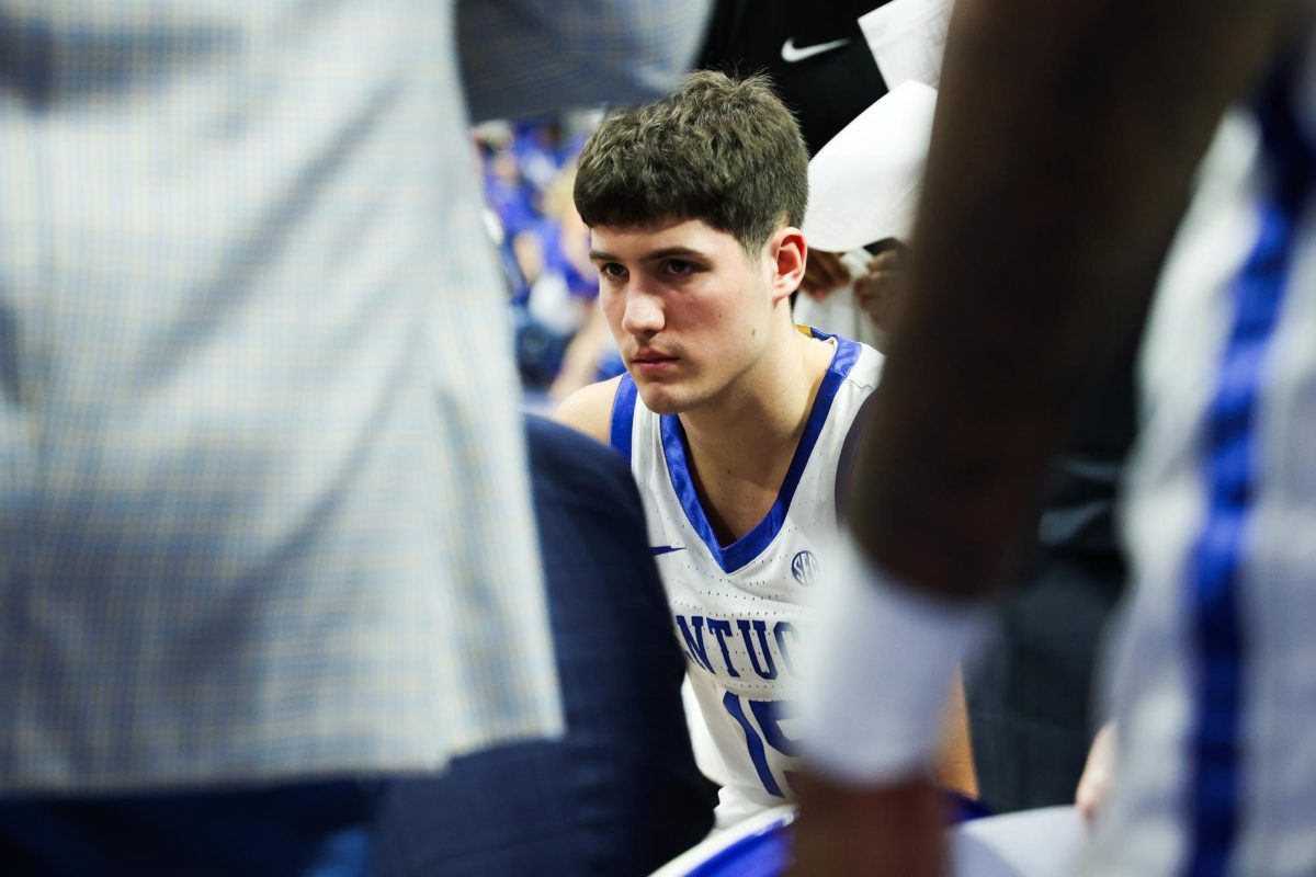 Kentucky guard Reed Sheppard listens during a timeout during the Kentucky vs. Mississippi State men’s basketball game on Wednesday, Jan. 17, 2024, at Rupp Arena in Lexington, Kentucky. Kentucky won 90-77. Photo by Abbey Cutrer | Staff