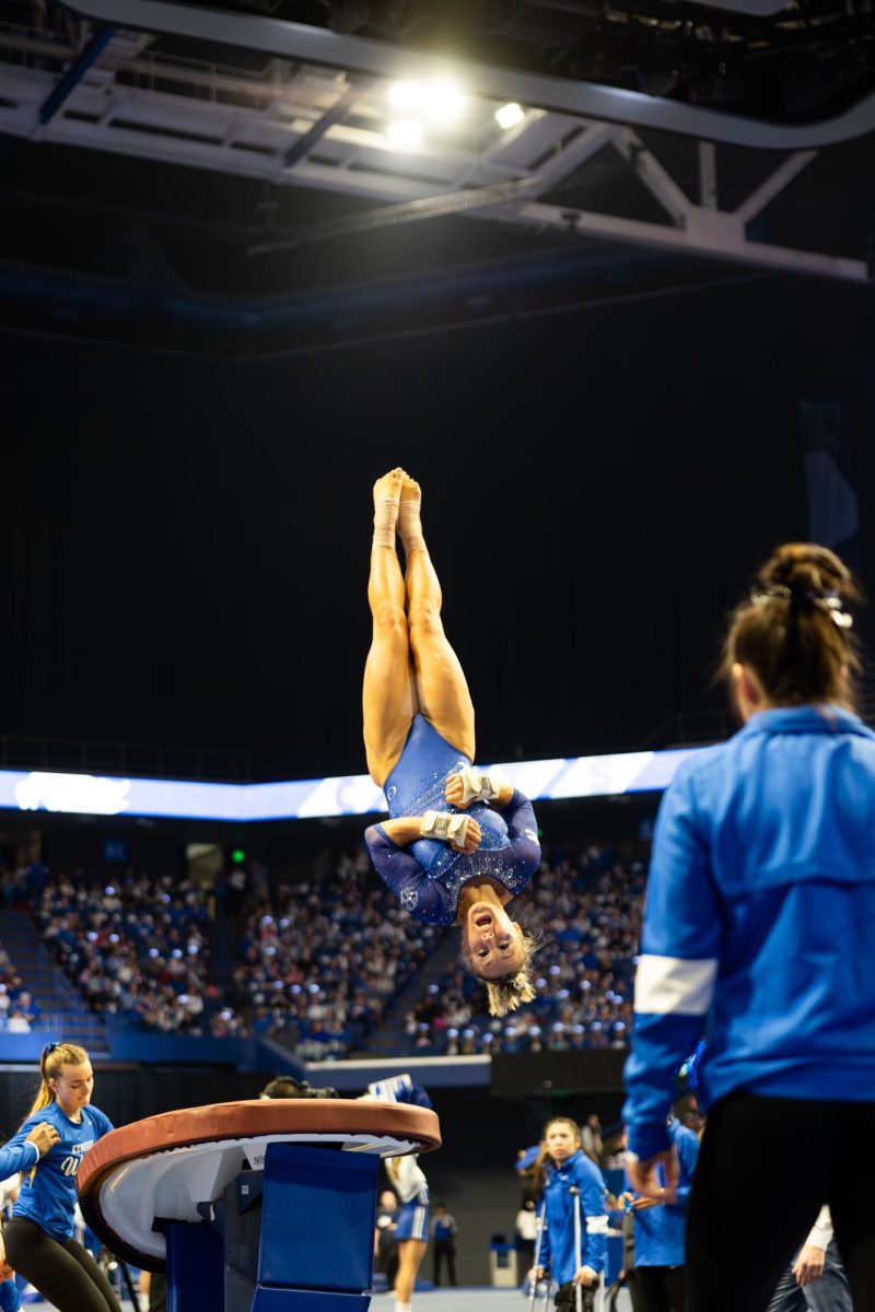 Fifth year Raena Worley flips over the vault during the No. 7 Kentucky vs. No. 18 Georgia gymnastics meet on Friday, January 26, 2024, at Rupp Arena in Lexington, Kentucky. Kentucky won 197.950-195.650. Photo by Ella Porter | Staff