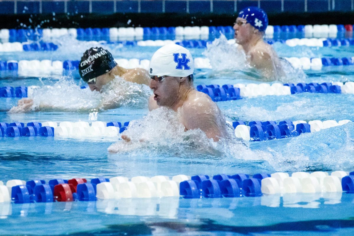 A Kentucky mens swimmer competes during the Kentucky Swim & Dive Senior Night and meet against the University of Cincinnati on Friday, Feb. 2, 2024, at the Lancaster Aquatic Center in Lexington, Kentucky. Kentucky Mens swim & dive won 186-111, while Kentucky Womens swim & dive won 207-93. Photo by Cameron Guagenti