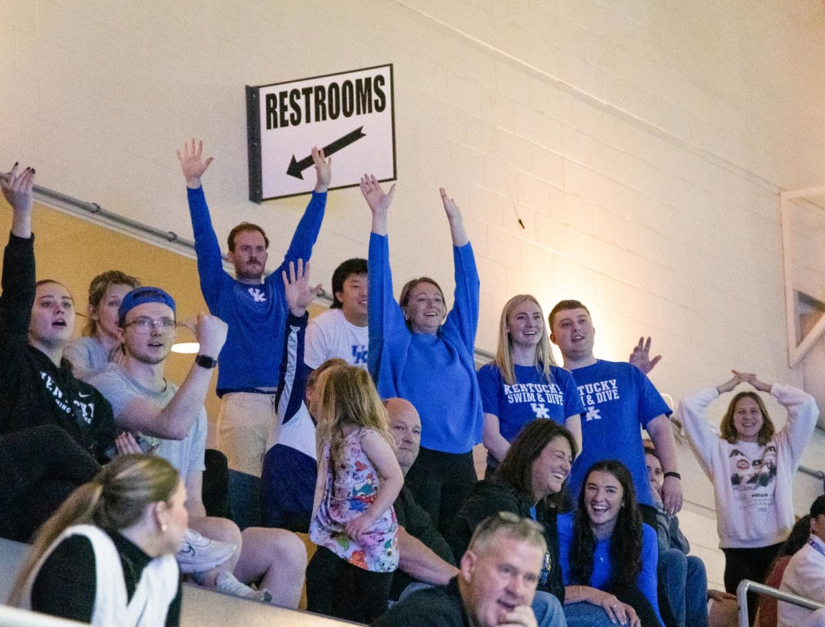 Fans call for a t-shirt during the Kentucky Swim & Dive Senior Night and meet against the University of Cincinnati on Friday, Feb. 2, 2024, at the Lancaster Aquatic Center in Lexington, Kentucky. Kentucky Mens swim & dive won 186-111, while Kentucky Womens swim & dive won 207-93. Photo by Cameron Guagenti