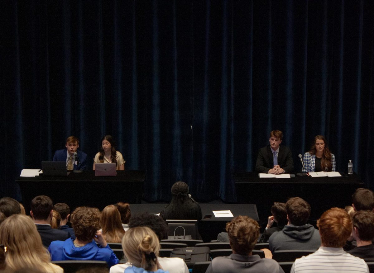 Candidates Dalton Bertram, Maddie Duff, Jackson Baird and Avery Bailey sit in front of students and listen to questions during the SGA debate on Feb. 20, 2024, in Lexington, Kentucky, at the University of Kentucky. Photo by Christian Kantosky | Staff