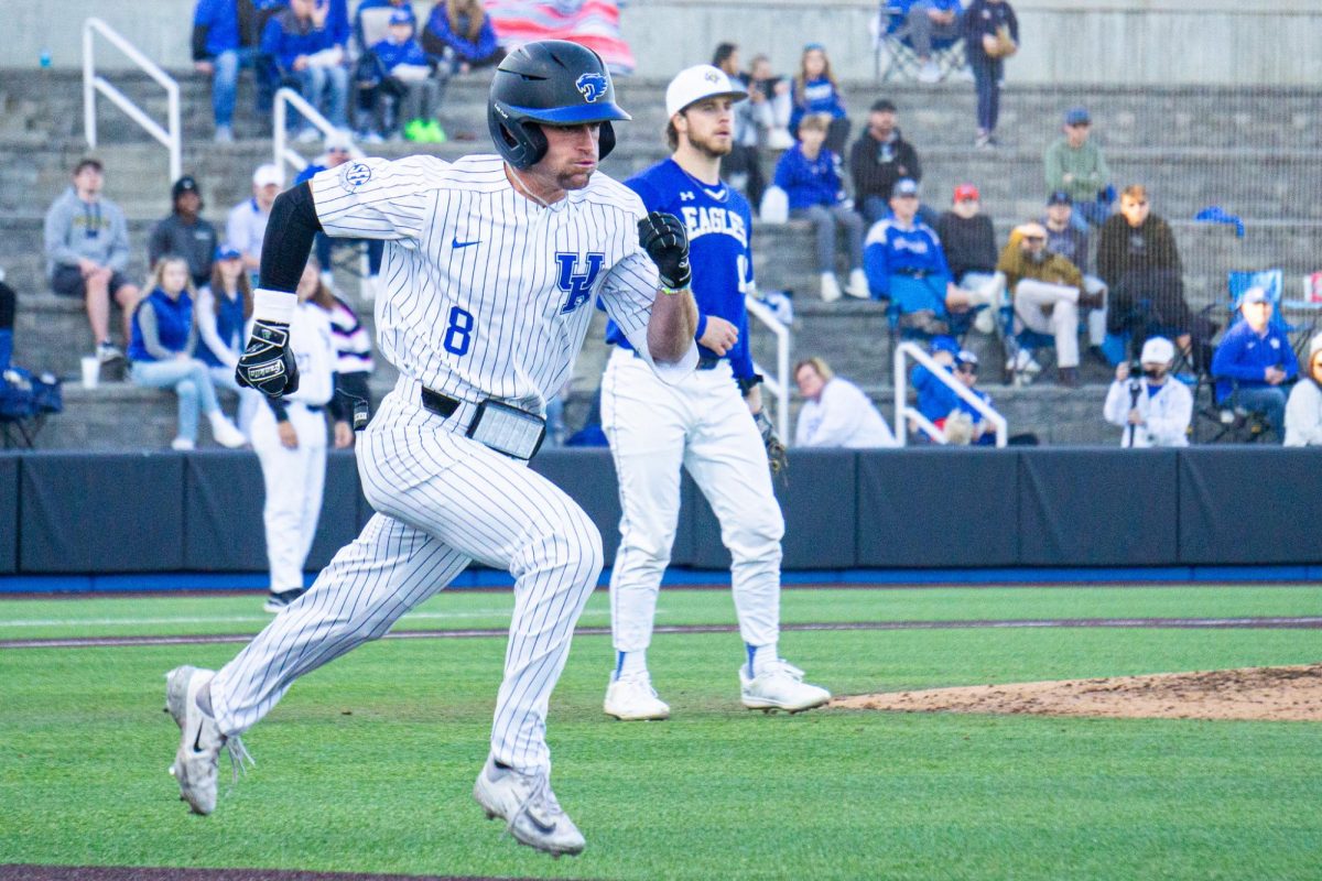 Kentucky Wildcats outfielder Ty Crittenberger dashes to first base during the Kentucky vs. Morehead State baseball game on Tuesday, Feb. 20, 2024, at Kentucky Proud Park in Lexington, Kentucky. Kentucky won 9-5. Photo by Isaiah Pinto | Staff