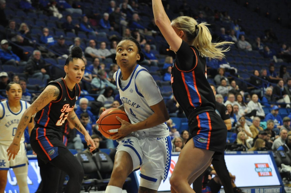 Kentucky guard Eniya Russell (4) drives to the basket during the Kentucky vs. Florida womens basketball game on Sunday, Feb. 18, 2024, at Rupp Arena in Lexington, Kentucky. Kentucky won 81-77. Photo by Isabella Sepahban | Staff 