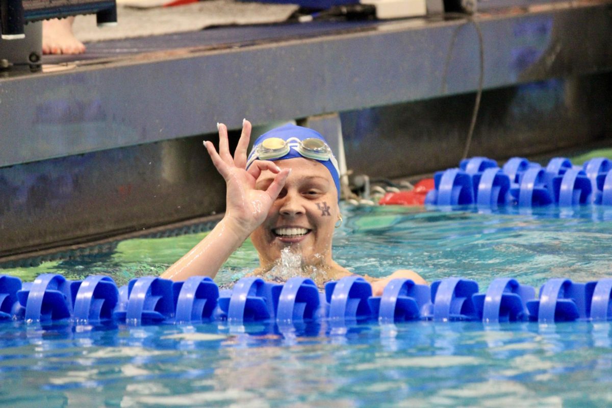 A Kentucky swimmer poses for a photo during the 2024 SEC Mens and Womens Swimming & Diving Championships on Saturday, Feb. 24, 2024, at the James E. Martin Aquatic Center in Auburn, Alabama. Photo by Jenna Lifshen | Staff