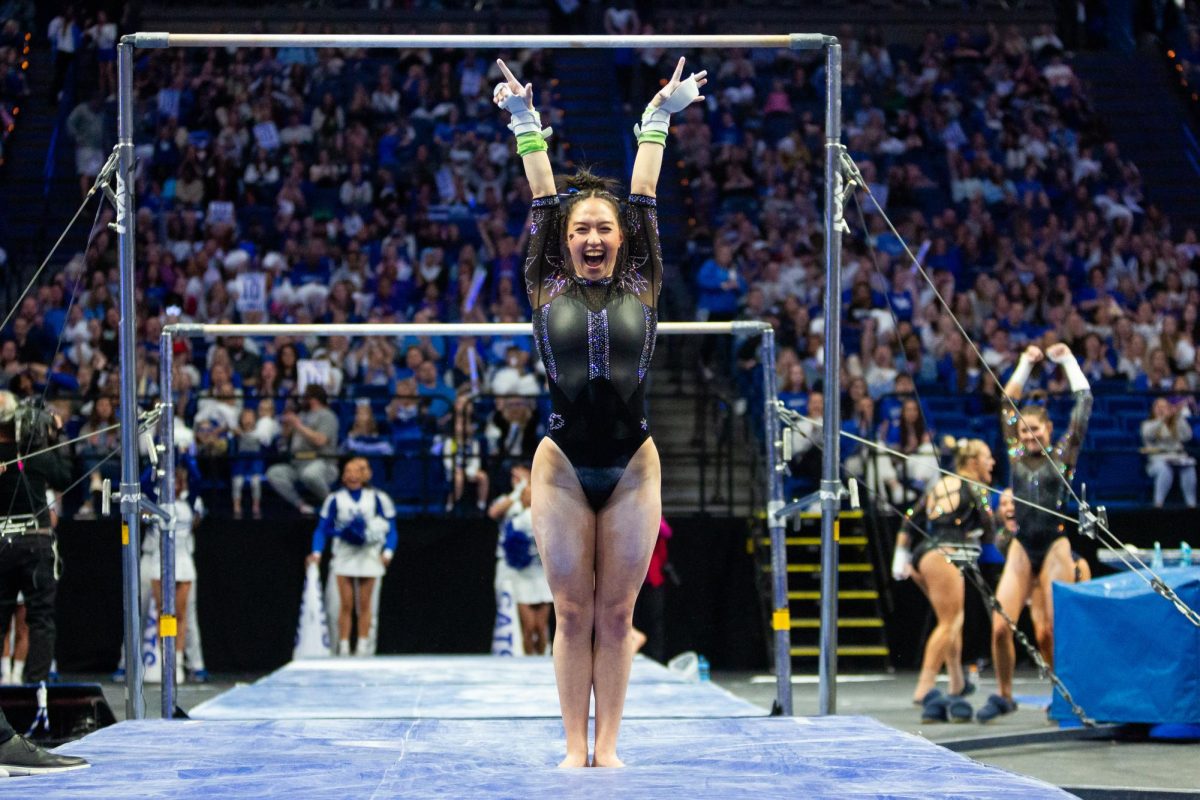 Cecily Rizo performs her bars routine during the No. 6 Kentucky vs No 5. Florida gymnastics meet on Sunday, March 3, 2024 at Rupp Arena in Lexington, Kentucky. Kentucky lost 198.100-198.225.