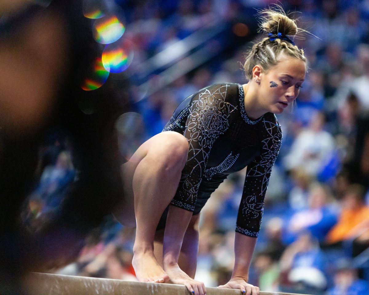 Delaynee Rodriguez warms up for her beam routine during the No. 6 Kentucky vs No 5. Florida gymnastics meet on Sunday, March 3, 2024 at Rupp Arena in Lexington, Kentucky. Kentucky lost 198.100-198.225.
