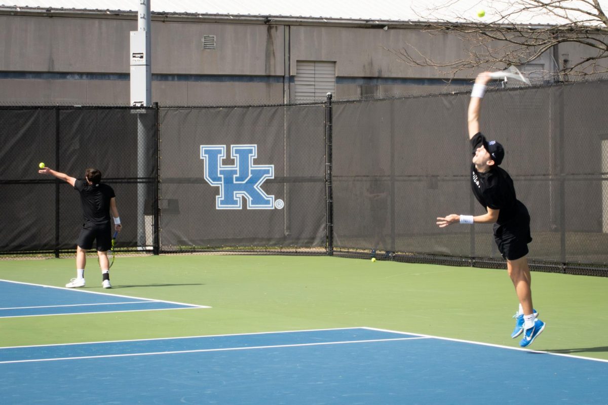 Kentucky players serve the ball during the No. 7 Kentucky vs. No. 18 Alabama mens tennis match on Sunday, March 3, 2024, at the Boone Tennis Complex in Lexington, Kentucky. Kentucky won 5-2. Photo by Cameron Guagenti | Staff