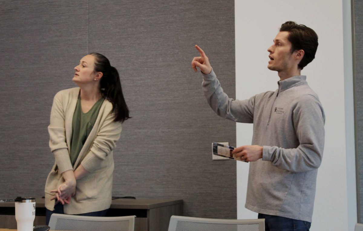 Lizzy Finley (left) and Thomas Ard speak during a QPR suicide prevention training at the Gatton Student Center on Tuesday, March 5, 2024, in Lexington, Kentucky. Photo by Helena Arjona | Staff