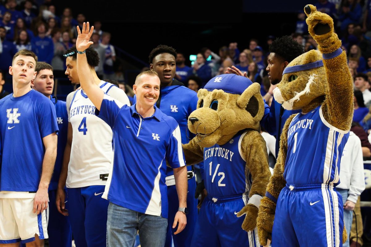 Louisville firefighter Bryce Carden waves with the team before the Kentucky men’s basketball game vs. Vanderbilt on Wednesday, March 6, 2024, at Rupp Arena in Lexington, Kentucky. Kentucky won 93-77. Photo by Abbey Cutrer | Staff
