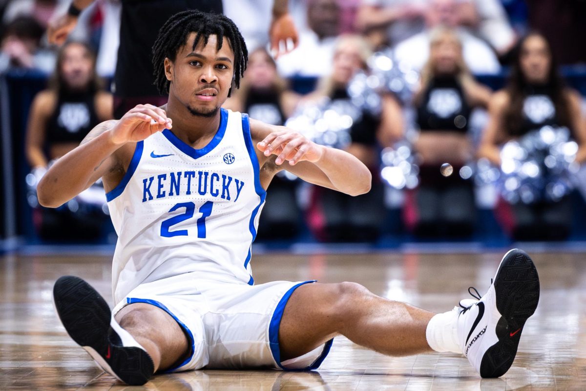 Kentucky+guard+DJ+Wagner+%2821%29+waits+to+be+helped+up+from+the+floor+after+fighting+for+a+loose+ball+during+the+No.+2+Kentucky+vs.+No.+7+Texas+A%26M+mens+basketball+game+in+the+SEC+Tournament+quarterfinals+on+Friday%2C+March+15%2C+2024%2C+at+Bridgestone+Arena+in+Nashville%2C+Tennessee.+Kentucky+lost+97-87.+Photo+by+Samuel+Colmar+%7C+Staff