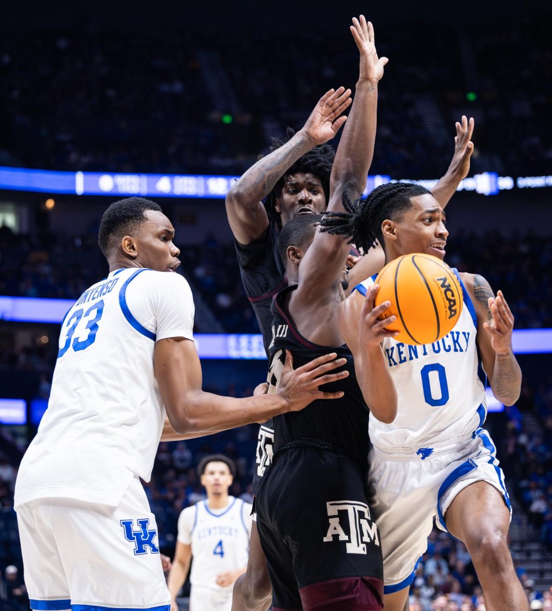 Kentucky guard Rob Dillingham (0) looks for a pass during the No. 2 Kentucky vs. No. 7 Texas A&M mens basketball match in the SEC Tournament quarterfinals on Friday, March 15, 2024, at Bridgestone Arena in Nashville, Tennessee. Kentucky lost 97-87. Photo by Samuel Colmar | Staff
