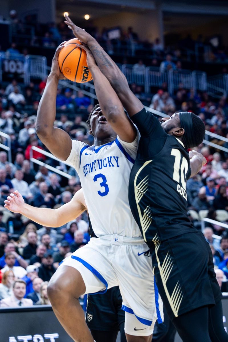Kentucky guard Adou Thiero (3) is fouled on a put-back attempt during the No. 3 Kentucky vs. No. 14 Oakland mens basketball game in the first round of the NCAA Tournament on Thursday, March 21, 2024, at the PPG Paints Arena in Pittsburgh, Pennsylvania. Kentucky lost 80-76. Photo by Samuel Colmar | Staff