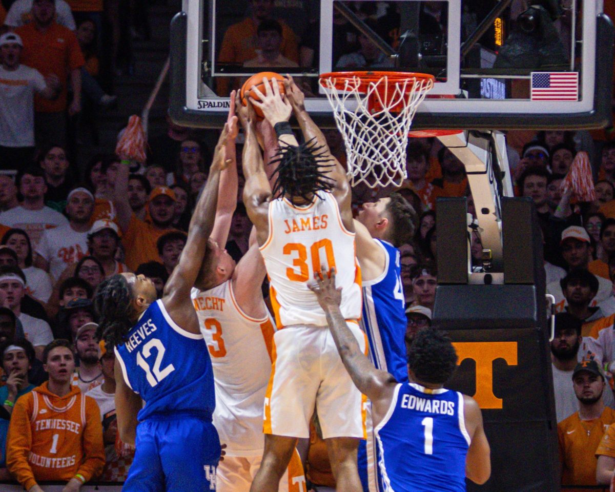 Kentucky forward Zvonimir Ivisic and guard Antione Reeves rise up to defend during the Kentucky men’s basketball game vs. Tennessee on Saturday, March 9, 2024, at the Food City Center in Knoxville, Tennessee. Kentucky won 85-81. Photo by Isaiah Pinto | Staff
