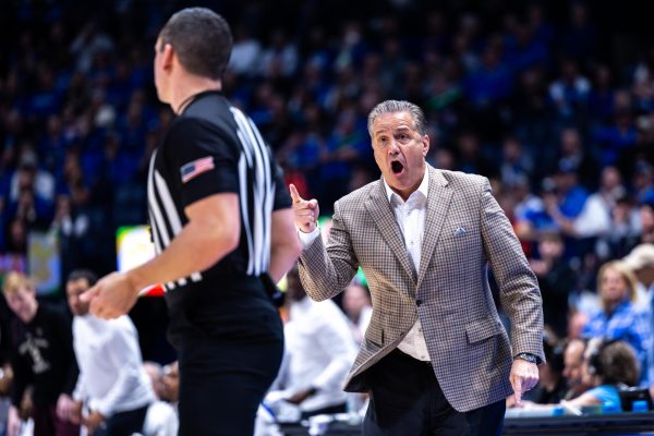 Kentucky head coach John Calipari argues with a referee during the No. 2 Kentucky vs. No. 7 Texas A&M mens basketball match in the SEC Tournament quarterfinals on Friday, March 15, 2024, at Bridgestone Arena in Nashville, Tennessee. Kentucky lost 97-87. Photo by Samuel Colmar | Staff