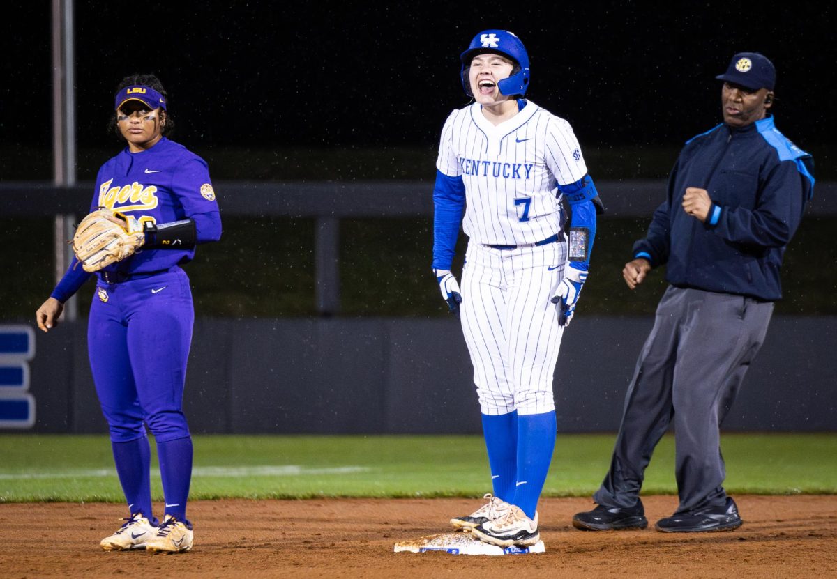 Kentucky utility player Ally Hutchins celebrates after getting a double during the No. 21 Kentucky vs. No. 3 LSU softball match on Friday, March 8, 2024, at John Cropp Stadium in Lexington, Kentucky. Kentucky lost 6-2. Photo by Samuel Colmar | Staff