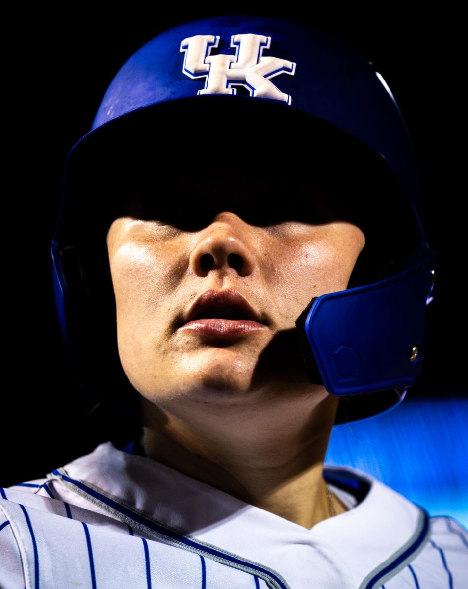 A Kentucky player looks into the crowd on deck during the No. 21 Kentucky vs. No. 3 LSU womens softball match on Friday, March 8, 2024, at John Cropp Stadium in Lexington, Kentucky. Kentucky lost 6-2. Photo by Samuel Colmar | Staff