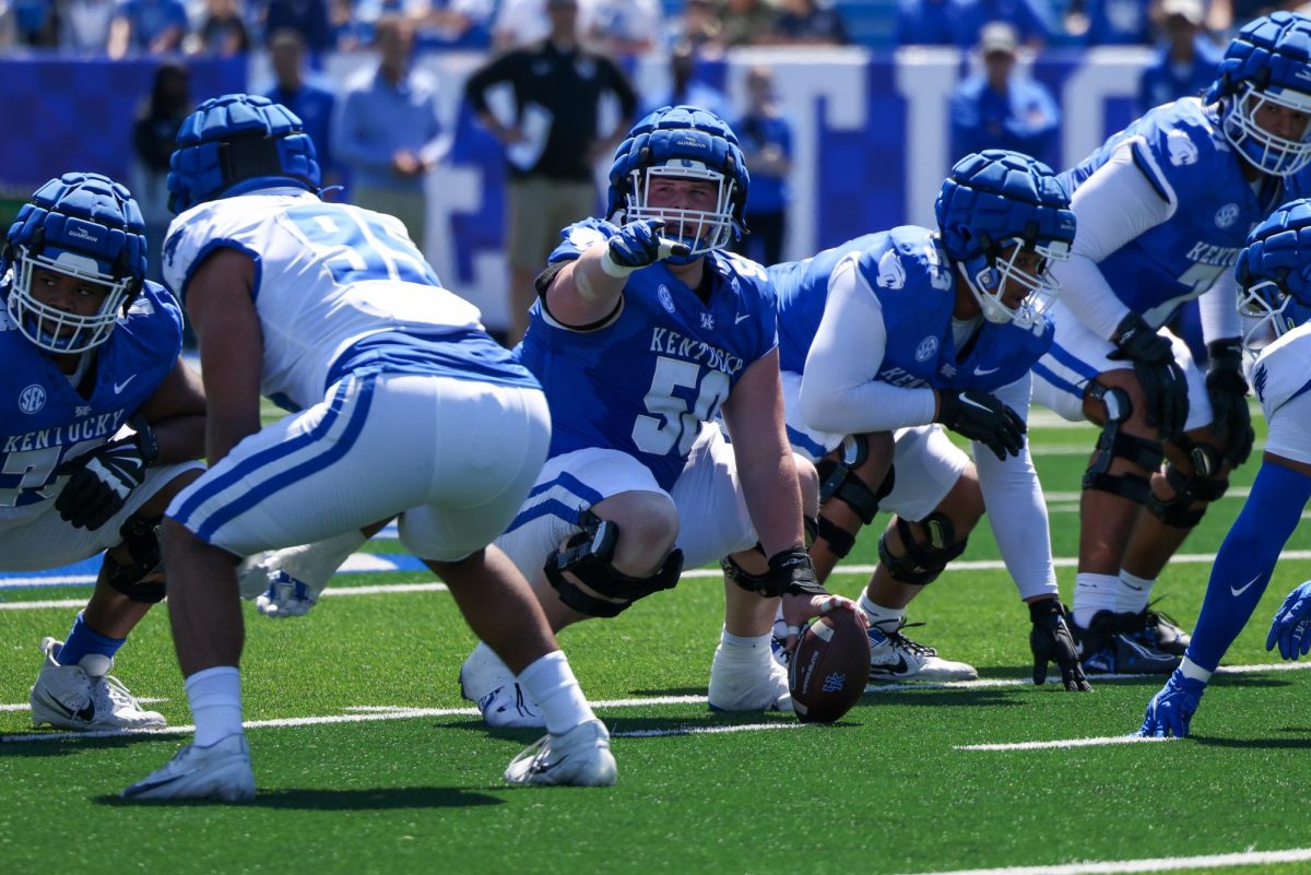 Kentucky offensive lineman Koby Keenum yells calls during the Kentucky Blue-White Spring football game on Saturday, April 13, 2024, at Kroger Field in Lexington, Kentucky. Photo by Sydney Yonker | Staff