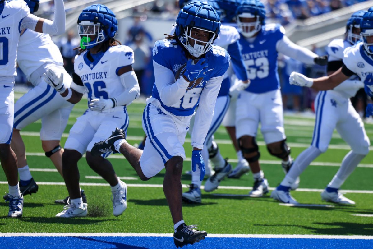 Kentucky Running back Jason Patterson runs the ball during the Kentucky Blue-White Spring football game on Saturday, April 13, 2024, at Kroger Field in Lexington, Kentucky. Photo by Sydney Yonker | Staff