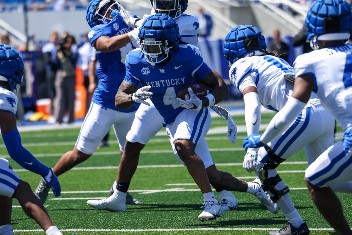 Kentucky running back DeaMonte “Chip” Trayanum runs the ball during the Kentucky Blue-White Spring football game on Saturday, April 13, 2024, at Kroger Field in Lexington, Kentucky. Photo by Sydney Yonker | Staff