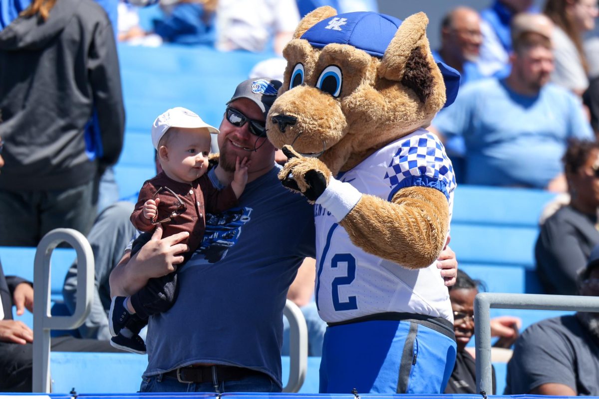 Kentucky mascot Scratch takes pictures with fans during the Kentucky Blue-White Spring football game on Saturday, April 13, 2024, at Kroger Field in Lexington, Kentucky. Photo by Sydney Yonker | Staff