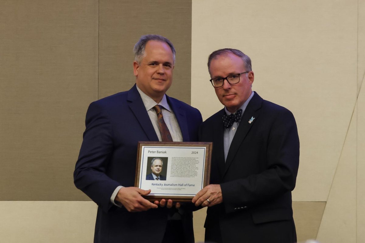 Duane Bonifer and Peter Baniak pose for a photo during the Kentucky Journalism Hall of Fame induction on Tuesday, April 9, 2024, at University of Kentucky in Lexington, Kentucky. Photo by Matthew Mueller | Staff