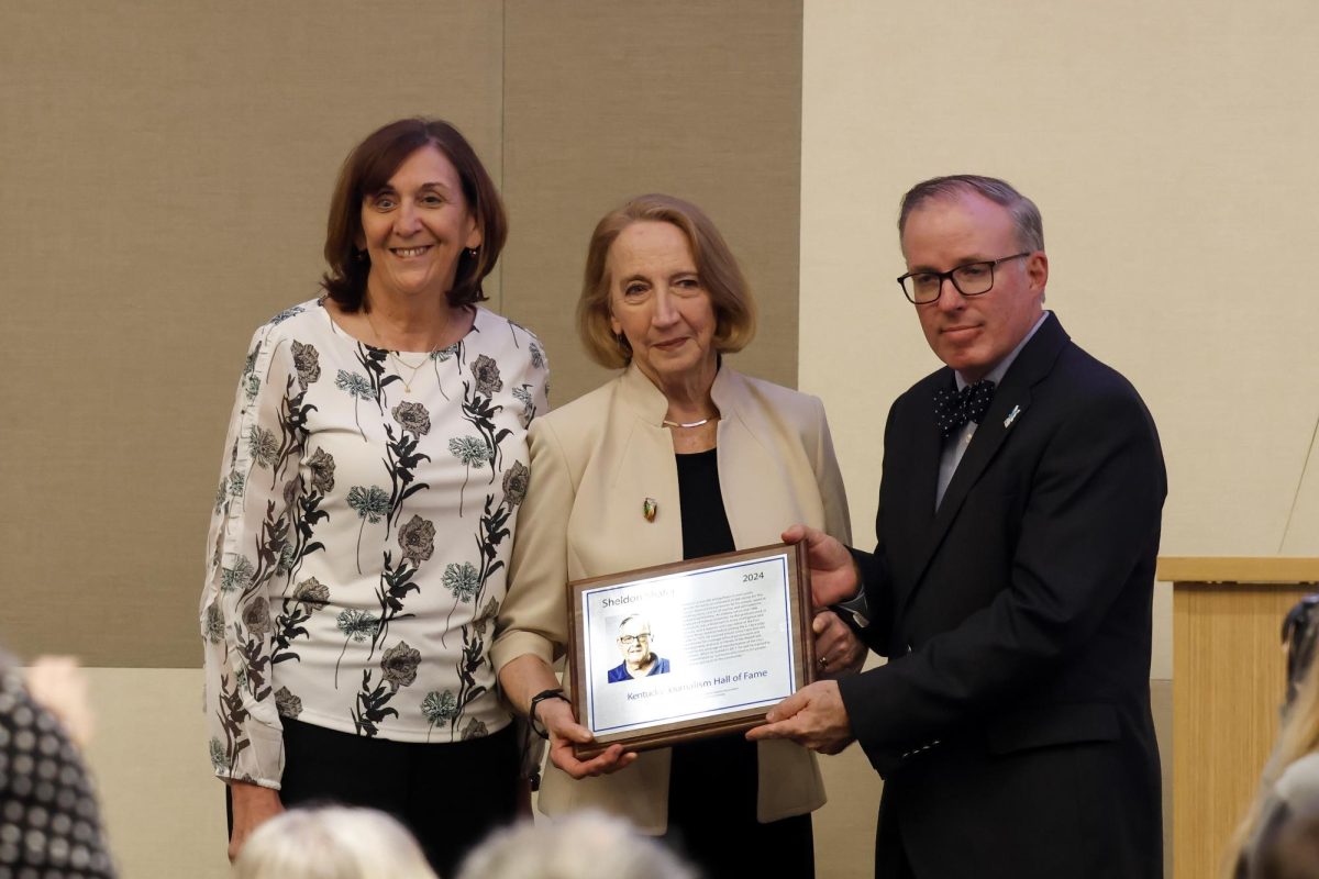 Deborah Yetter and Jean Porter accept the late Sheldon Shafer’s induction into the Kentucky Journalism Hall of Fame on Tuesday, April 9, 2024, at University of Kentucky in Lexington, Kentucky. Photo by Matthew Mueller | Staff