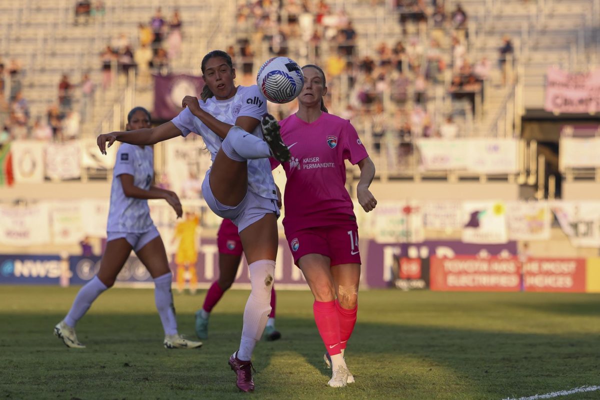 Elexa Bahr keeps the ball out of San Diego’s possession on Saturday, April 13, 2024, at Lynn Family Stadium in Louisville, Kentucky. Racing FC tied 0-0 with San Diego Wave.  Photo by Matthew Mueller | Staff