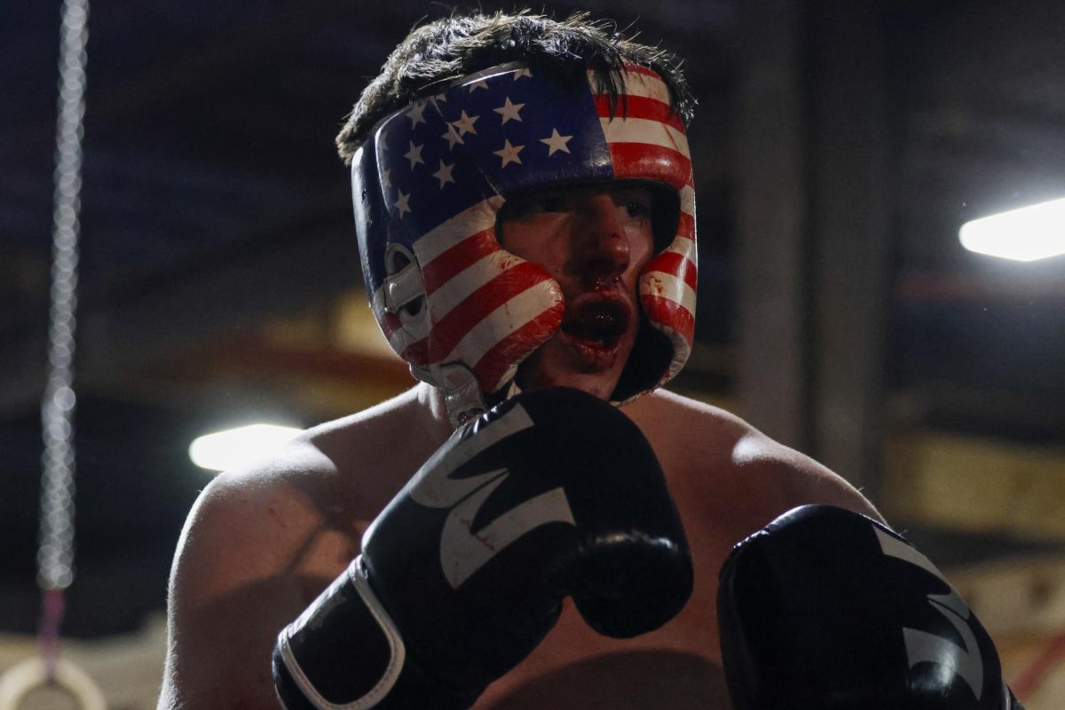 Aiden Greenwell bleeds during the UK Boxing club exhibition match on Friday, April 12, 2024, at Thrive Tribe Boxing club in Lexington, Kentucky. Photo by Matthew Mueller | Staff